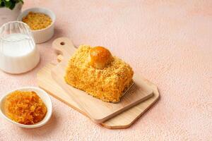 Nastar Cake is vanilla sponge based with crumbs, layered by pineapple jam and cheese cream. Topping with nastar cookies crumbs photo