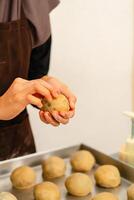 Mooncake making process. A mooncake is a Chinese bakery product traditionally eaten during the Mid Autumn Festival. photo