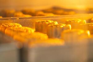 Mooncake making process. A mooncake is a Chinese bakery product traditionally eaten during the Mid Autumn Festival. photo