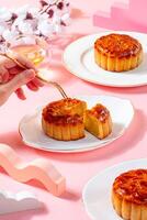 A mooncake is a Chinese bakery product traditionally eaten during the Mid-Autumn Festival. photo