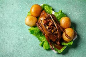 Teo Chew Braised Duck with ingredients such as Roasted Pork, Chinese Sausage, Salted Egg York, Ginko nut, Mushroom inside the duck photo