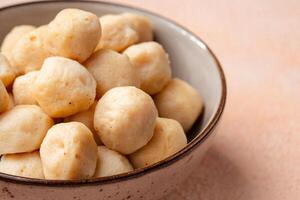 Bakso Ayam, Raw Indonesian Chicken Meatball in a bowl photo