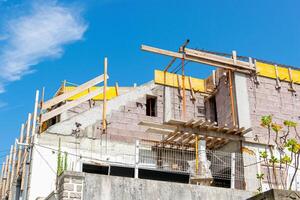 partial view of the attic of a house under construction photo
