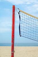 partial view of a volleyball net on the beach, summer concept photo