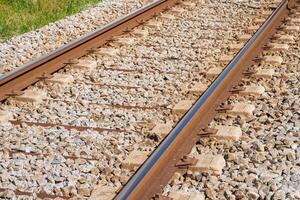 close-up detail view of a rail of a railway line photo