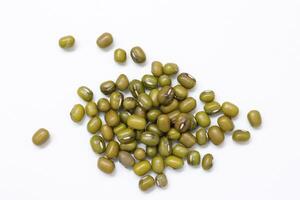 Top view of green mung beans on white background, mung beans seeds photo