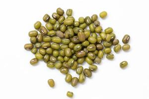 Top view of green mung beans on white background, mung beans seeds photo