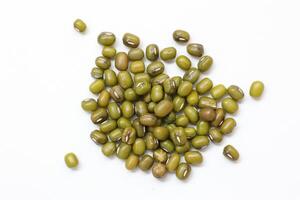 Top view of green mung beans on white background, mung beans seeds photo