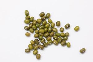 Top view of green mung beans on white background, mung beans seeds photo