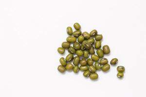 Top view of green mung beans on white background, mung beans seeds photo