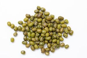 Top view of green mung beans on white background, mung beans seeds photo