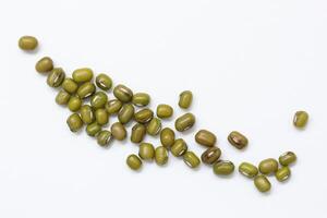 Top view of green mung beans on white background, mung beans seeds photo