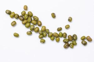 Top view of green mung beans on white background, mung beans seeds photo