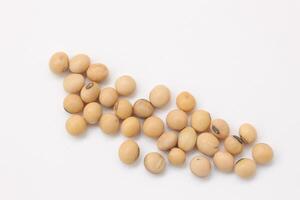 soybean seeds on white background photo
