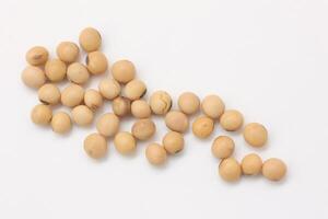 soybean seeds on white background photo