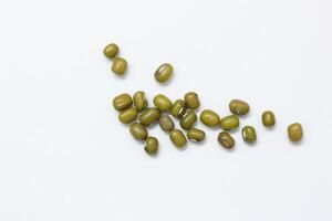 Top view of green mung beans on white background, mung beans seeds photo