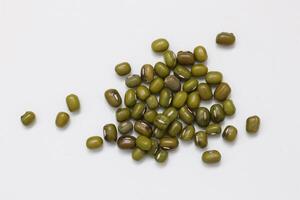 Top view of green mung beans on white background, mung beans seeds photo