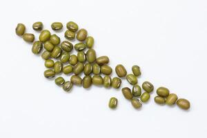 Top view of green mung beans on white background, mung beans seeds photo