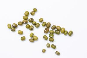 Top view of green mung beans on white background, mung beans seeds photo