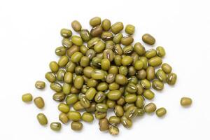 Top view of green mung beans on white background, mung beans seeds photo