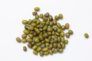 Top view of green mung beans on white background, mung beans seeds photo