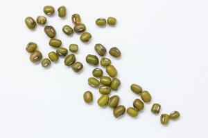 Top view of green mung beans on white background, mung beans seeds photo
