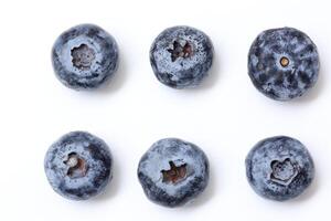 Top view of blueberry fruit on white background, berries fruits on white background, ripe blueberries fruit photo