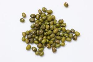 Top view of green mung beans on white background, mung beans seeds photo