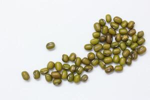 Top view of green mung beans on white background, mung beans seeds photo