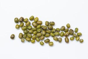 Top view of green mung beans on white background, mung beans seeds photo