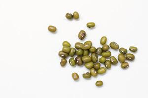 Top view of green mung beans on white background, mung beans seeds photo