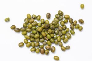 Top view of green mung beans on white background, mung beans seeds photo
