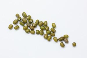 Top view of green mung beans on white background, mung beans seeds photo