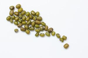 Top view of green mung beans on white background, mung beans seeds photo