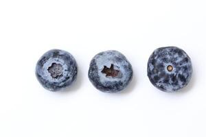 Top view of blueberry fruit on white background, berries fruits on white background, ripe blueberries fruit photo