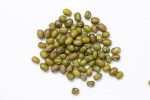 Top view of green mung beans on white background, mung beans seeds photo
