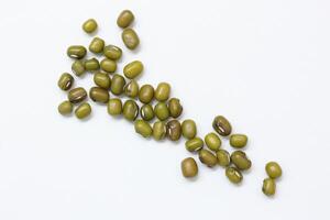 Top view of green mung beans on white background, mung beans seeds photo