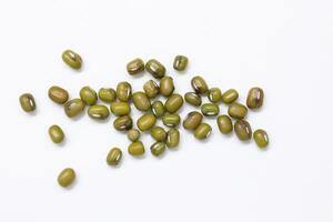 Top view of green mung beans on white background, mung beans seeds photo