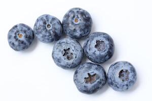 Top view of blueberry fruit on white background, berries fruits on white background, ripe blueberries fruit photo