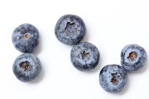 Top view of blueberry fruit on white background, berries fruits on white background, ripe blueberries fruit photo