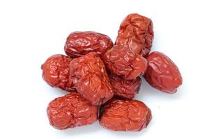 Dried fruit on white background, dried jujube on white background photo