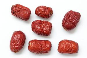 Dried fruit on white background, dried jujube on white background photo