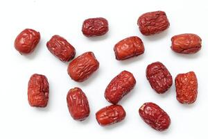 Dried fruit on white background, dried jujube on white background photo