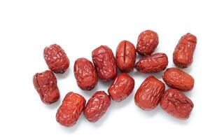 Dried fruit on white background, dried jujube on white background photo