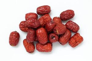 Dried fruit on white background, dried jujube on white background photo