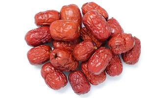 Dried fruit on white background, dried jujube on white background photo