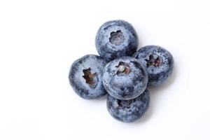 Top view of blueberry fruit on white background, berries fruits on white background, ripe blueberries fruit photo