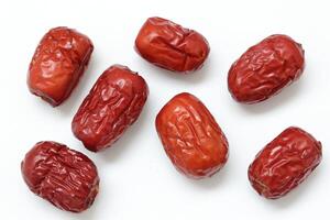 Dried fruit on white background, dried jujube on white background photo