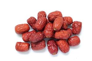 Dried fruit on white background, dried jujube on white background photo