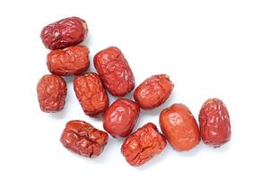 Dried fruit on white background, dried jujube on white background photo